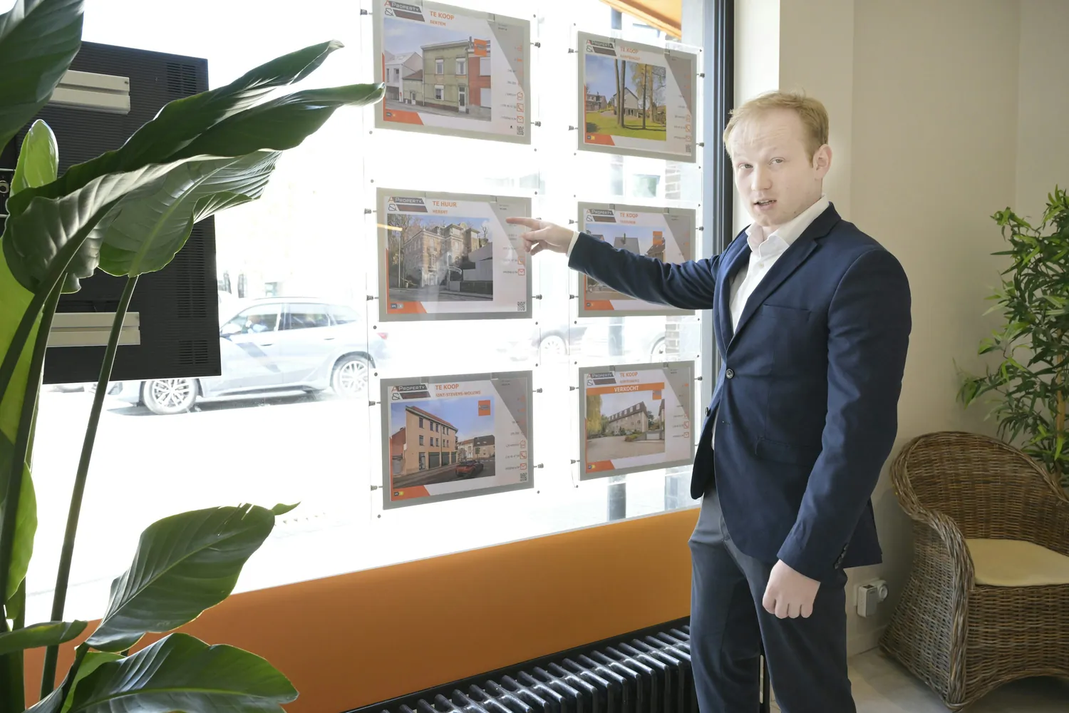 Property professionals discussing a building in an office